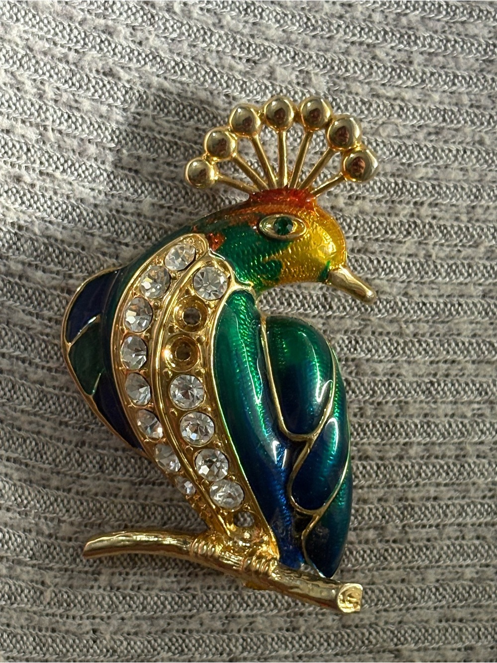 Vintage gold tone multicolor rhinestone embedded peacock brooch-missing 3 stones